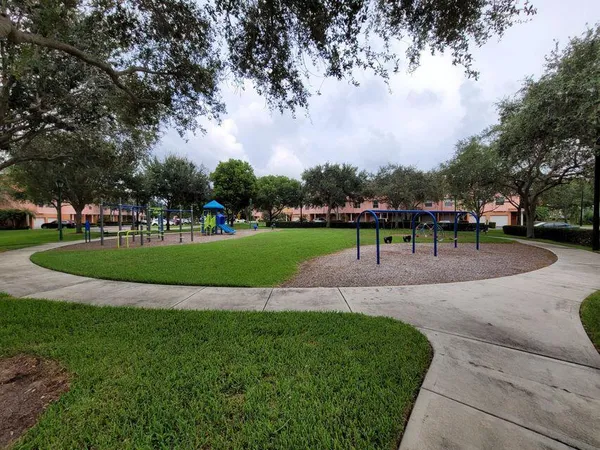 a view of a park with benches
