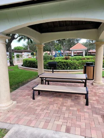 a park view with a bench