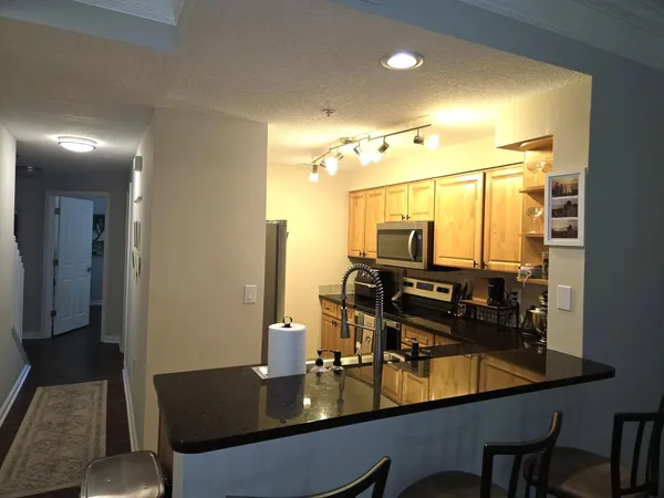 a view of a dining room with furniture