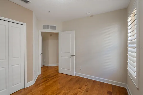 a view of an empty room and window