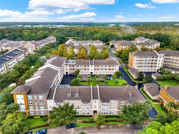 an aerial view of a house with a garden