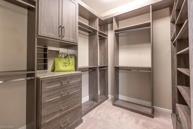 a kitchen with appliances and cabinets