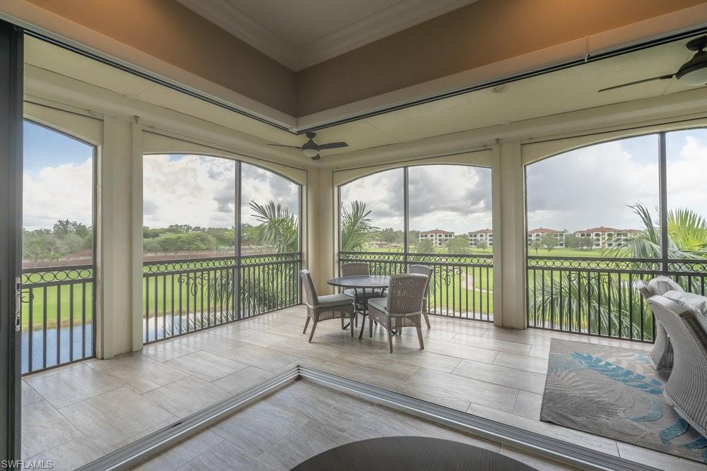 16444 Carrara Way, Unit 7301 Naples, FL 34110 - Photo 8 of 42 a view of a city from a balcony