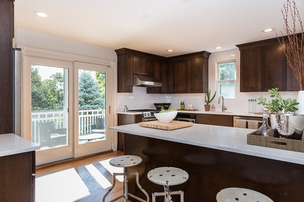 26 Vinal Avenue, Unit 1 Somerville, MA 02143 - Photo 1 of 17 a kitchen with a sink refrigerator and cabinets