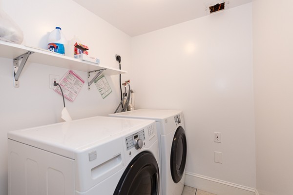 26 Vinal Avenue, Unit 1 Somerville, MA 02143 - Photo 17 of 17 a utility room with dryer and washer