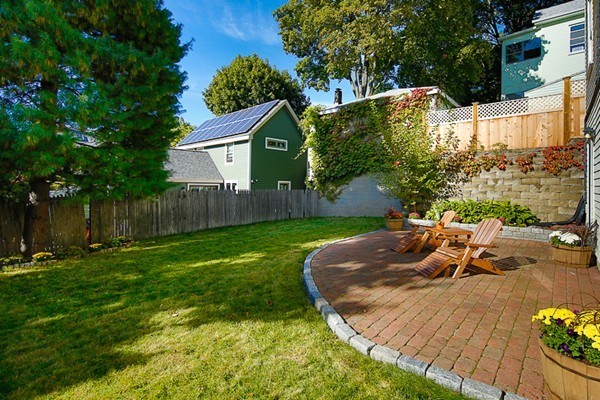 26 Vinal Avenue, Unit 1 Somerville, MA 02143 - Photo 6 of 17 a view of a house with backyard and sitting area