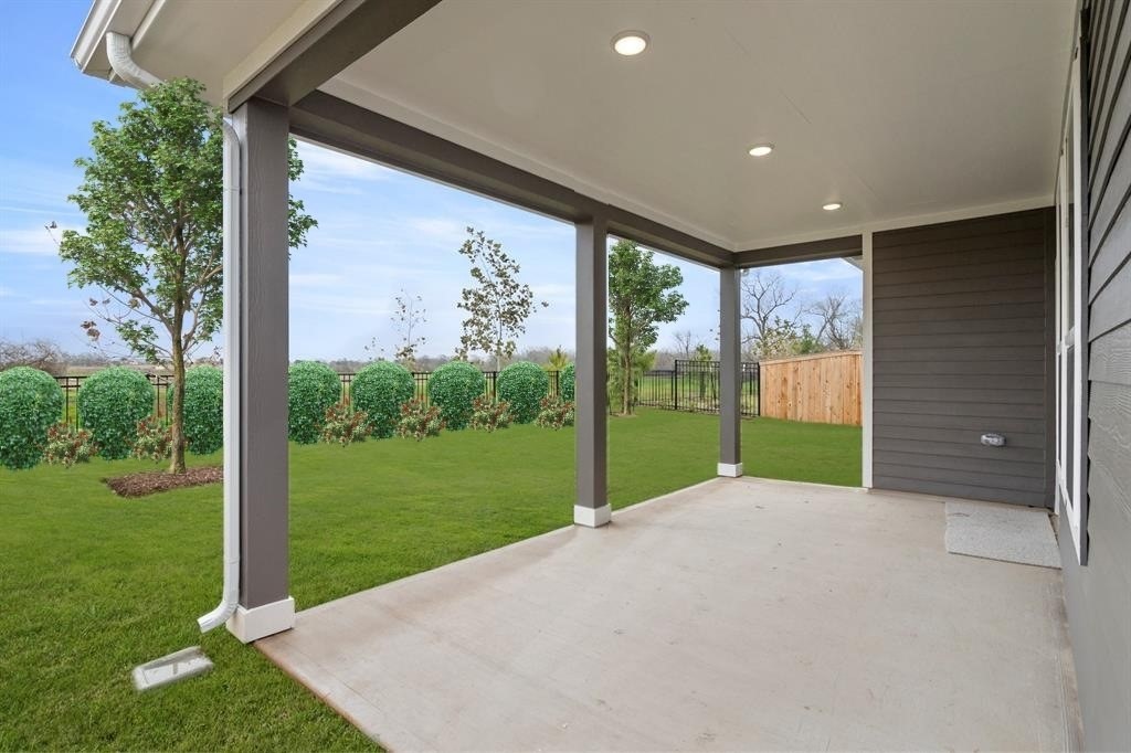8239 Red Shiner Way Fulshear, TX 77441 - Photo 17 of 25 a view of a garden with an outdoor space