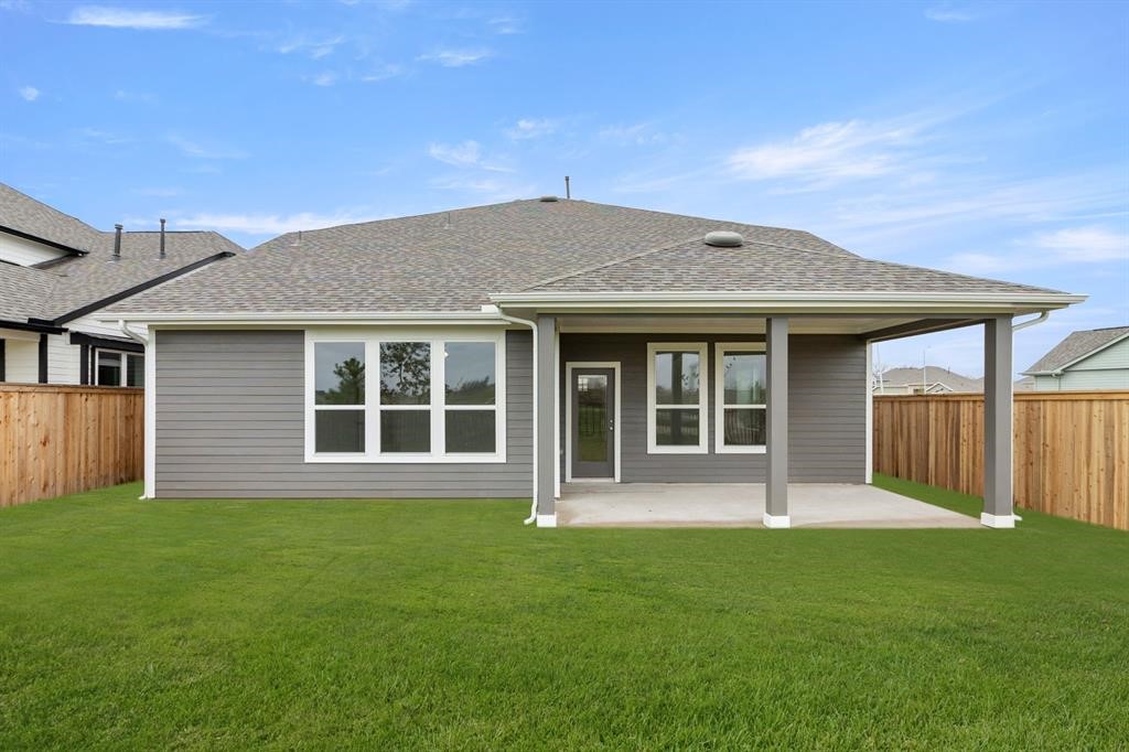 8239 Red Shiner Way Fulshear, TX 77441 - Photo 19 of 25 a house view with a garden space