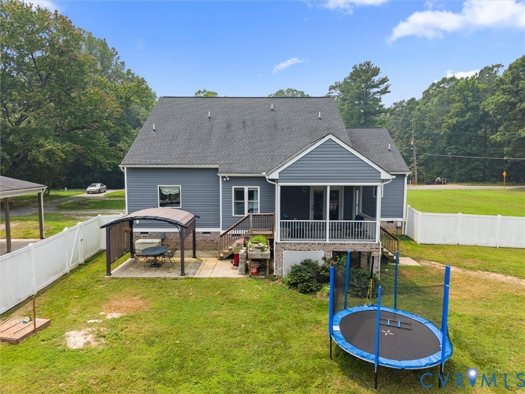 11390 Rocky Ridge Road Glen Allen, VA 23059 - Photo 8 of 82 Rear exterior featuring a screened porch, wood dec