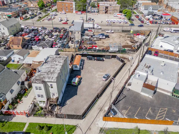 an aerial view of a houses with outdoor space