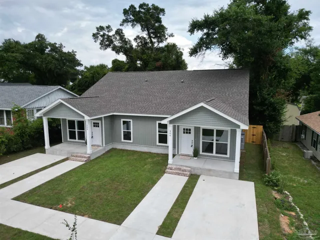 front view of a house with a yard