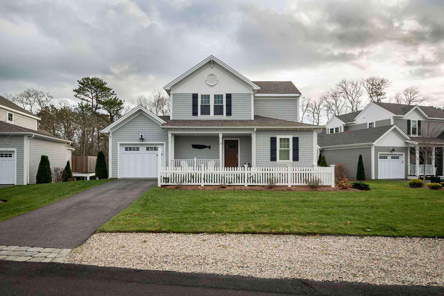 39 Cottage Lane Mashpee, MA 02649 - Photo 1 of 35 a front view of a house with a yard