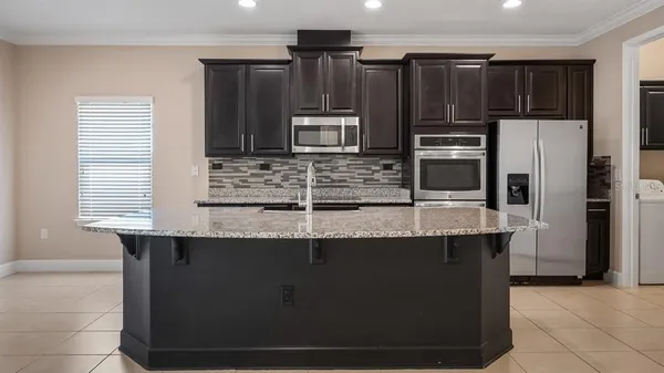 $475,000 | 476 Bellissimo Place, Howey-in-the-Hills, FL 34737