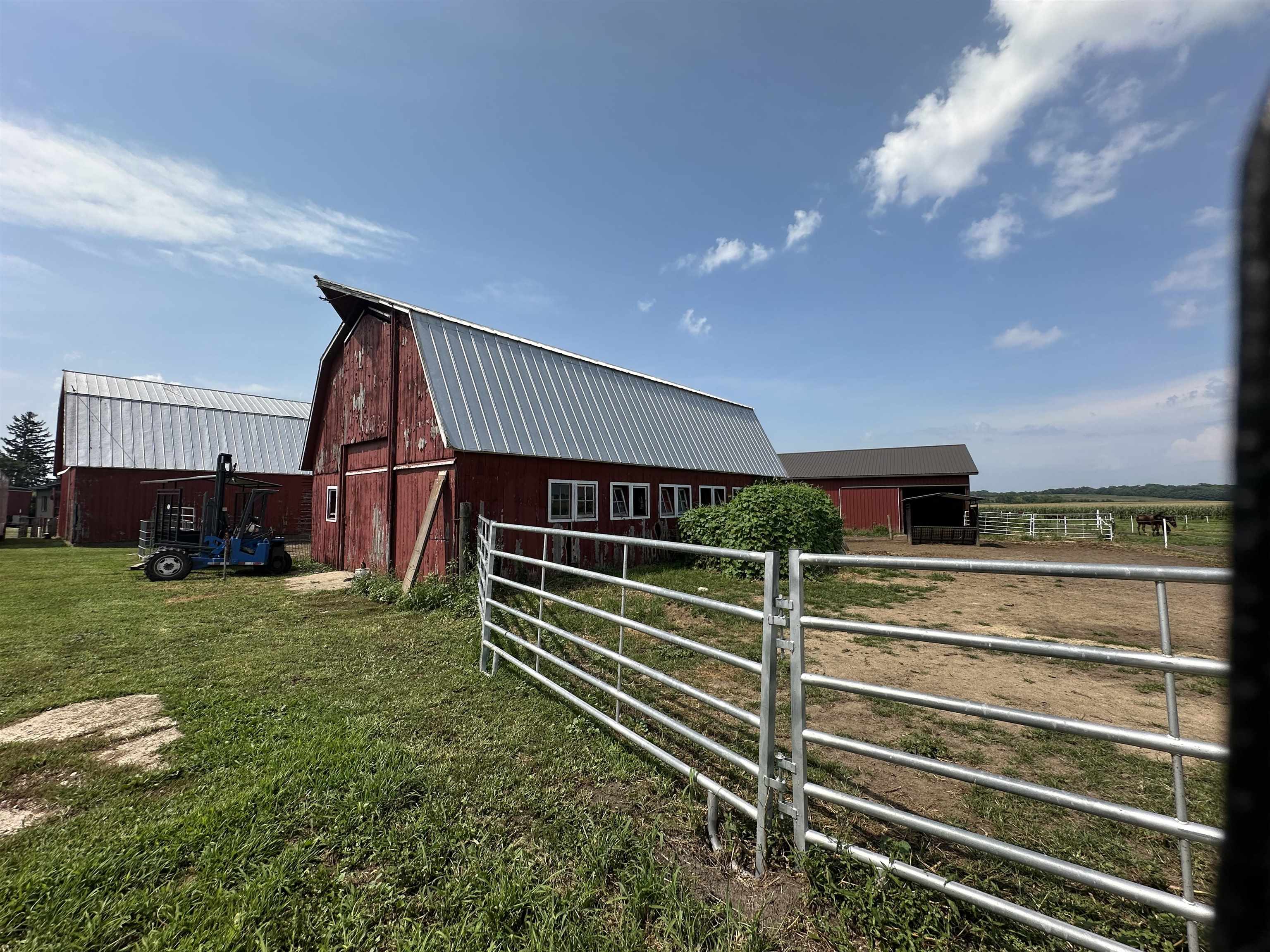 9896 Lincoln Road Morrison, IL 61270 - Photo 11 of 38 a view of backyard with deck and outdoor seating
