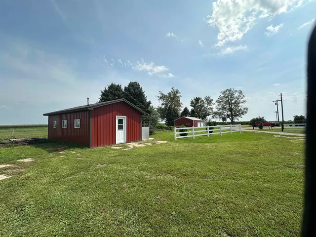 a view of a house with a big yard