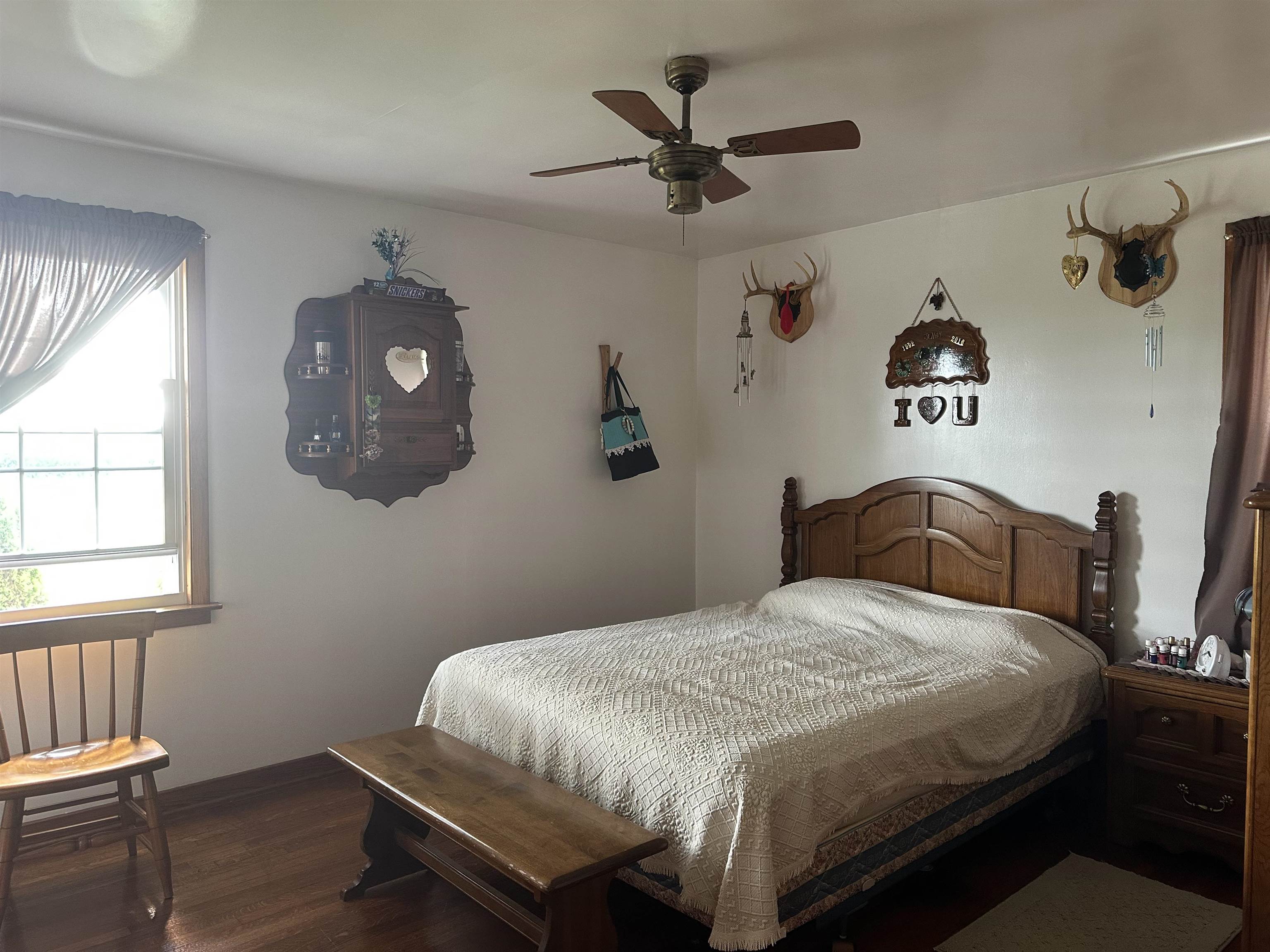 9896 Lincoln Road Morrison, IL 61270 - Photo 30 of 38 a bedroom with a bed and a window