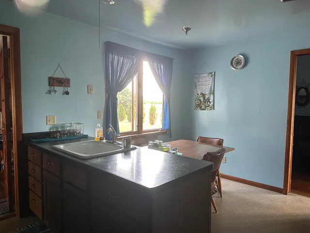 a dining room with table and chair
