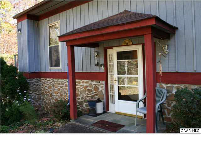 1233 Jacks Shop Road Rochelle, VA 22738 - Photo 2 of 30 a front view of a house with a garden