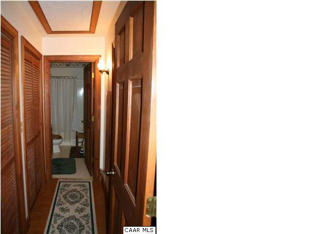 1233 Jacks Shop Road Rochelle, VA 22738 - Photo 21 of 30 a view of a hallway with the glass door and bedroom