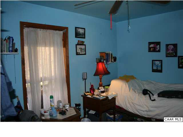 1233 Jacks Shop Road Rochelle, VA 22738 - Photo 23 of 30 a living room with furniture and a bed