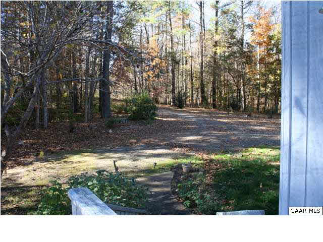 1233 Jacks Shop Road Rochelle, VA 22738 - Photo 7 of 30 a view of a backyard with trees