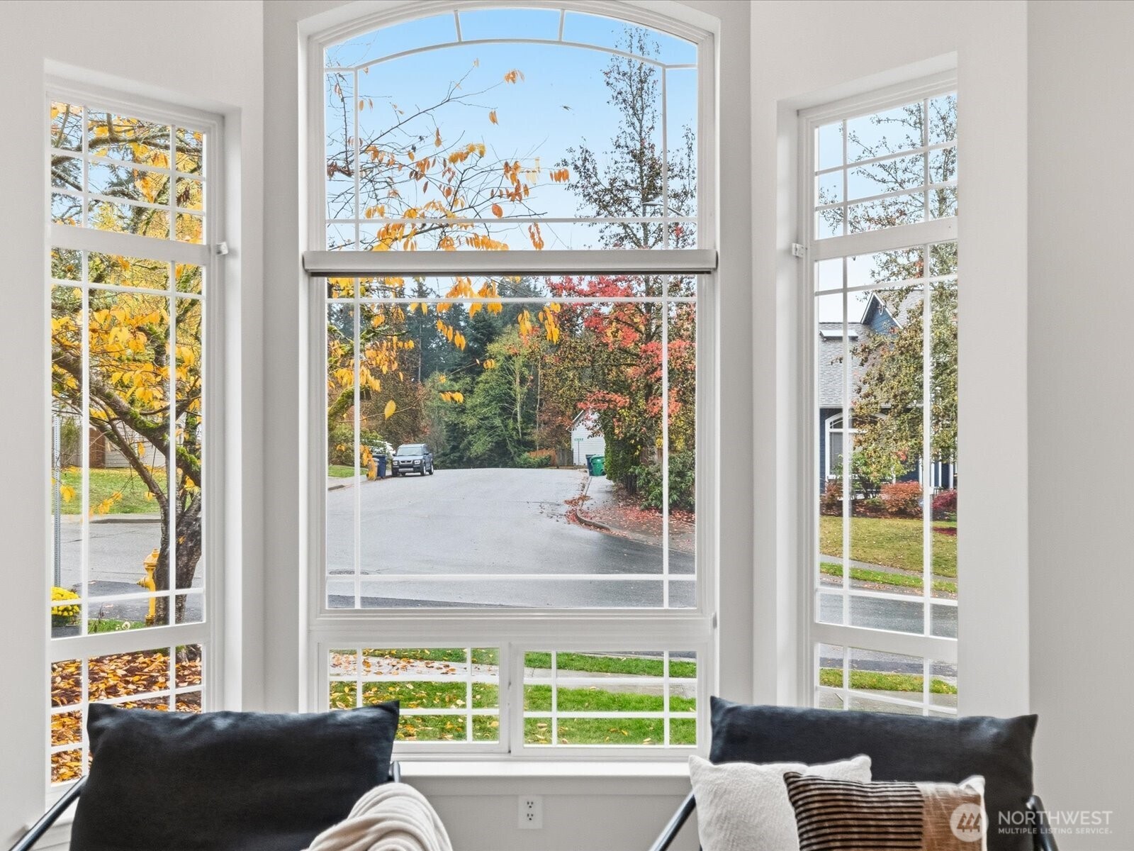 3129 200th Place Southeast Bothell, WA 98012 - Photo 2 of 38 a view of a living room filled with furniture and a large window