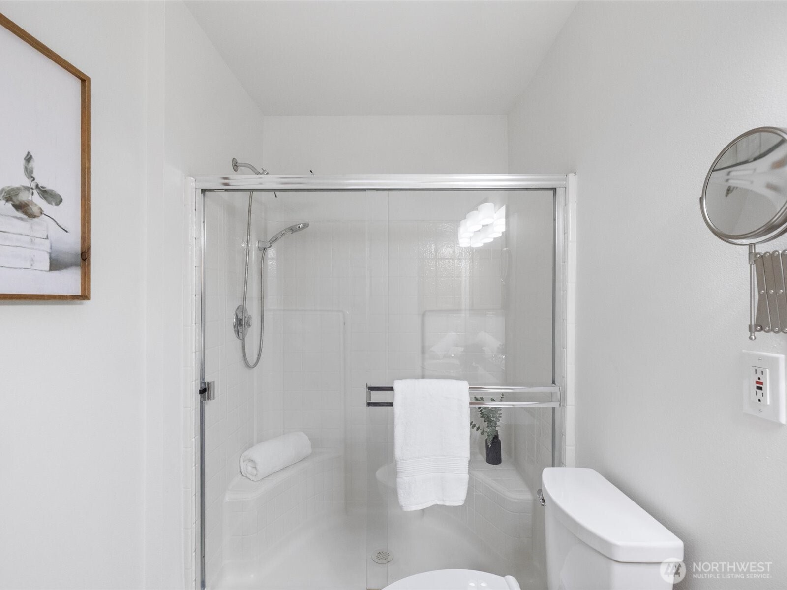 3129 200th Place Southeast Bothell, WA 98012 - Photo 21 of 38 a white toilet sitting next to a bathroom sink