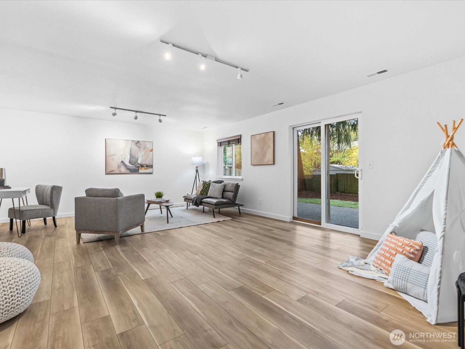 3129 200th Place Southeast Bothell, WA 98012 - Photo 24 of 38 a living room with furniture and a large window