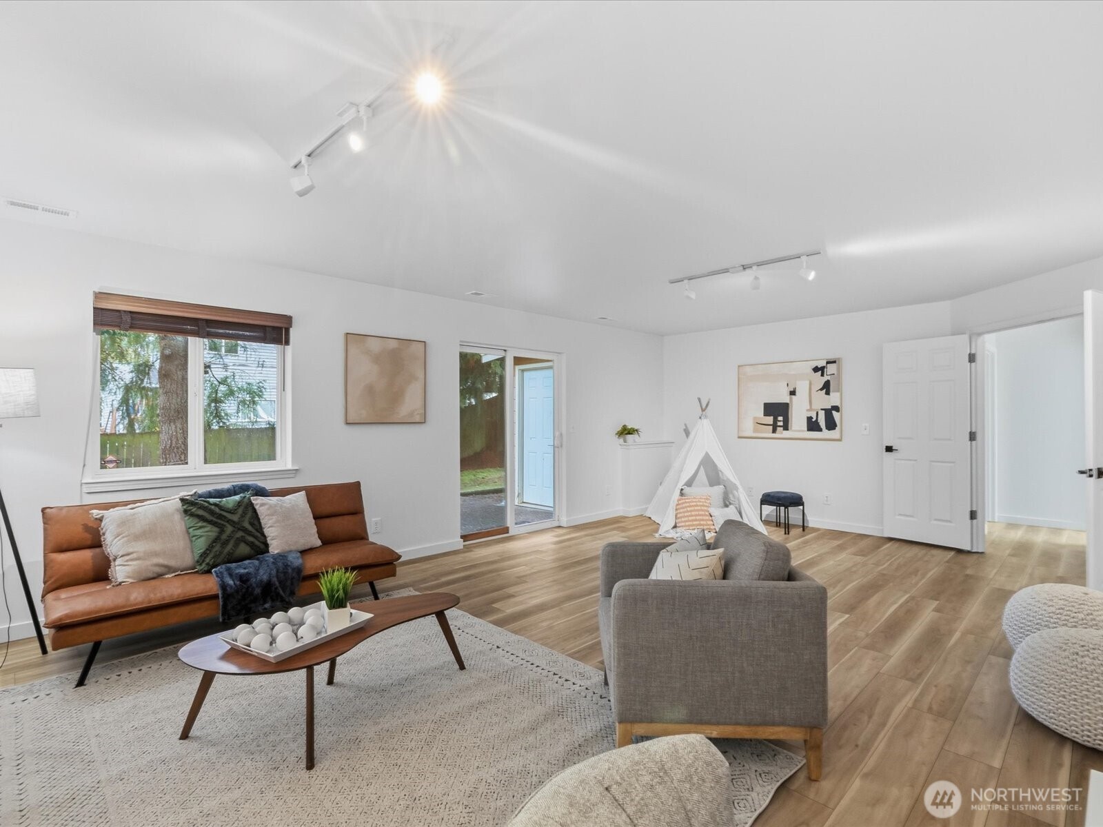3129 200th Place Southeast Bothell, WA 98012 - Photo 25 of 38 a living room with furniture and a large window