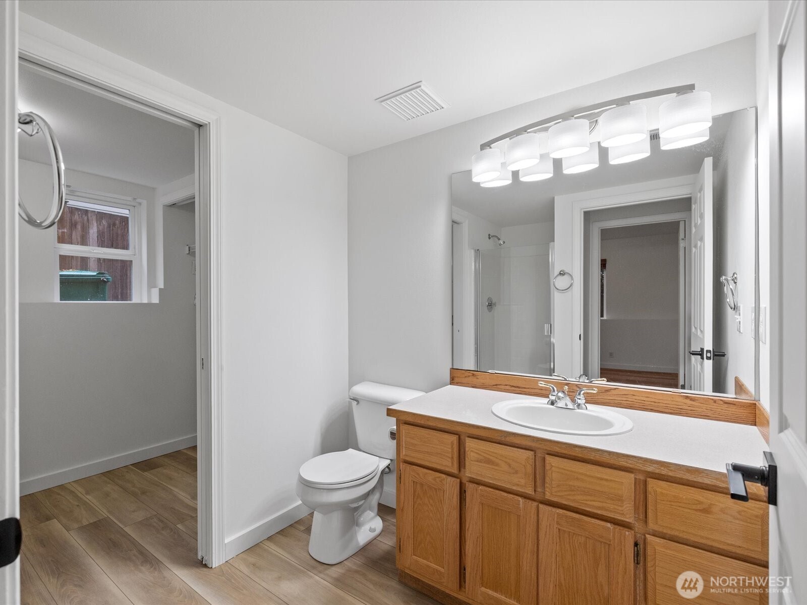 3129 200th Place Southeast Bothell, WA 98012 - Photo 28 of 38 a bathroom with a toilet sink and mirror