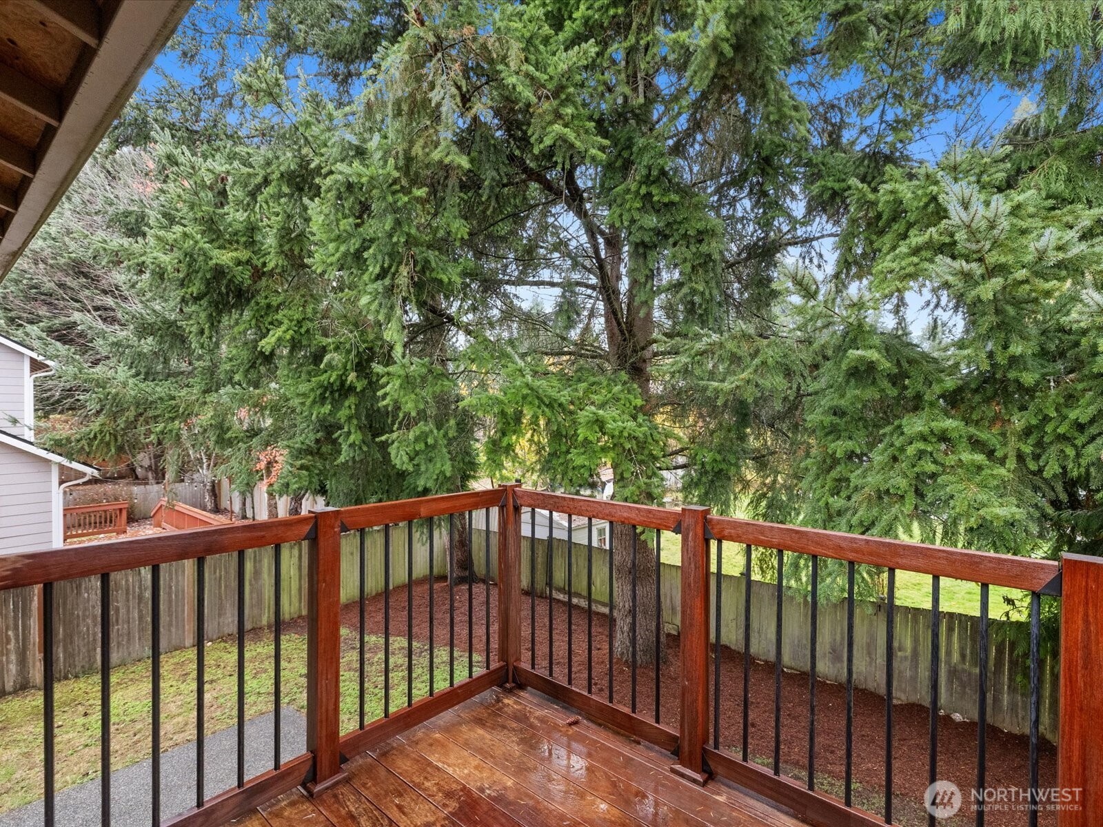 3129 200th Place Southeast Bothell, WA 98012 - Photo 29 of 38 a view of a wooden fence