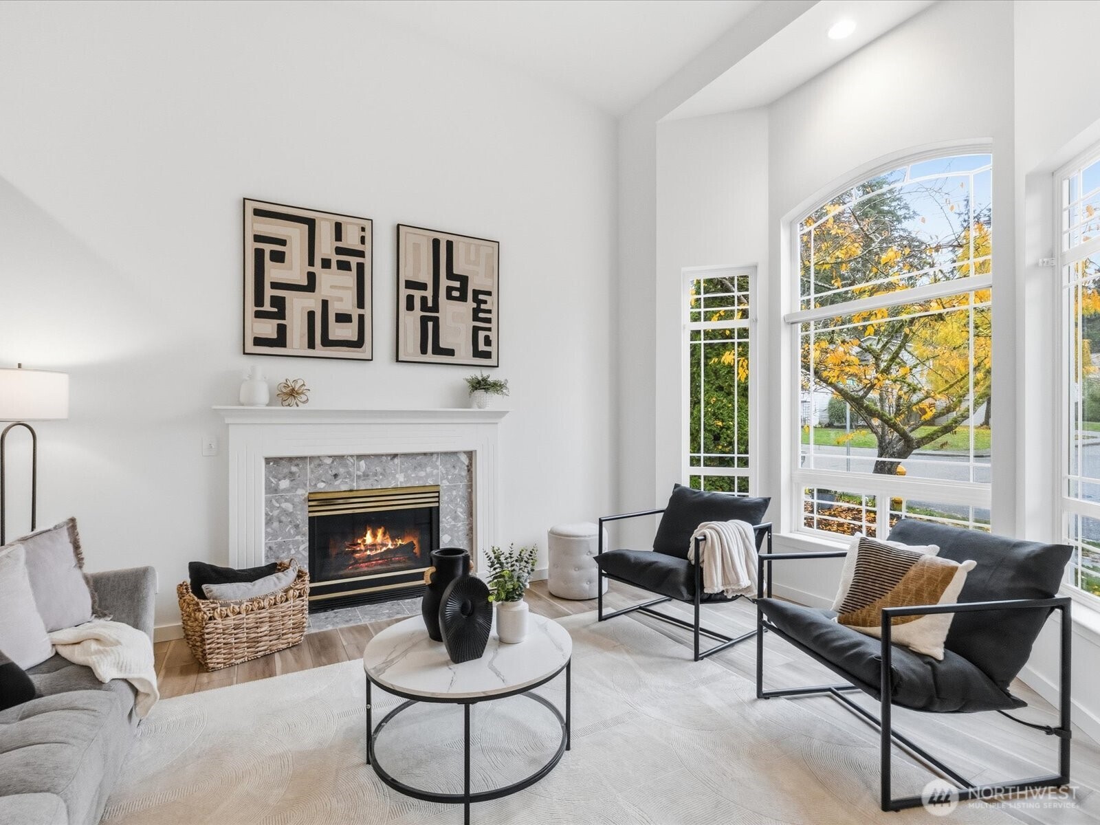 3129 200th Place Southeast Bothell, WA 98012 - Photo 4 of 38 a living room with furniture and a fireplace
