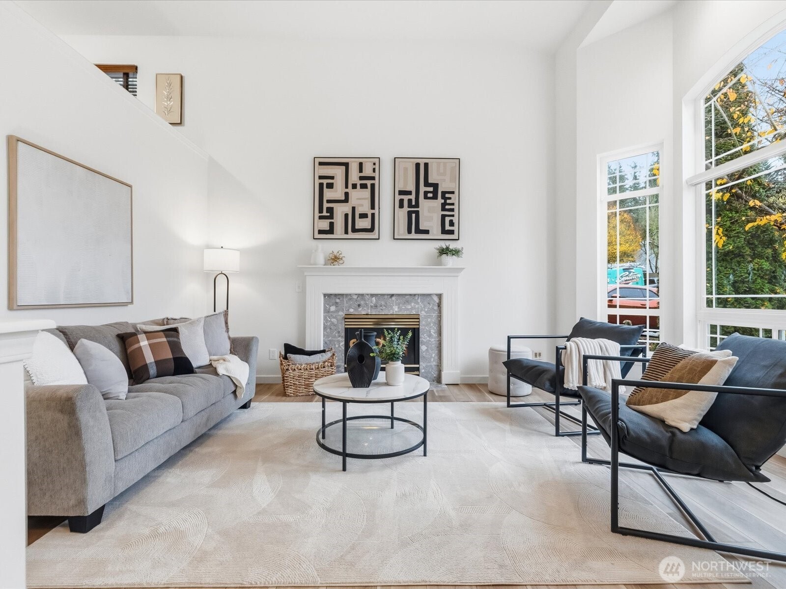 3129 200th Place Southeast Bothell, WA 98012 - Photo 5 of 38 a living room with furniture and a fireplace