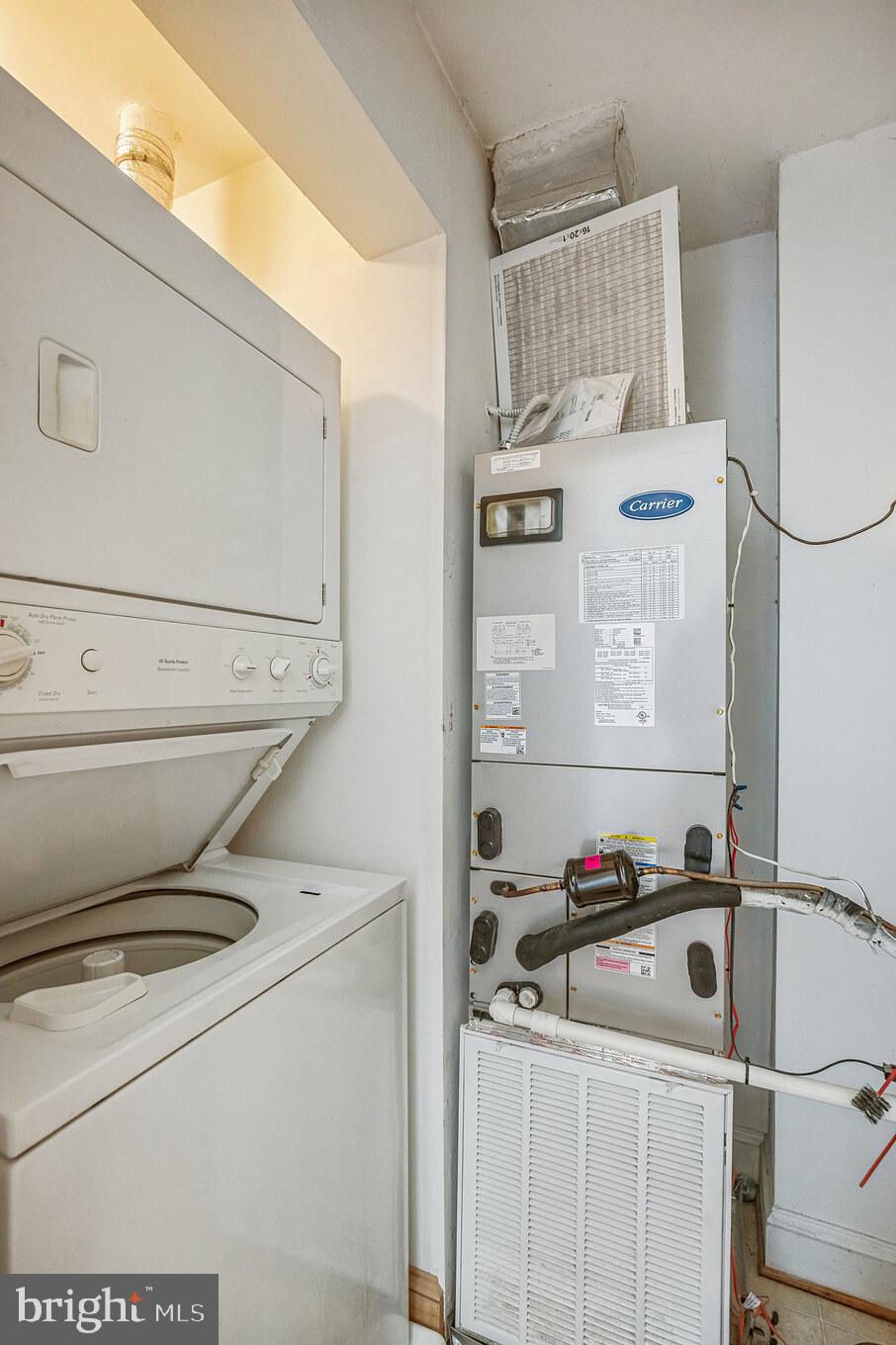 534 Runabout Loop, Unit 534 Solomons, MD 20688 - Photo 21 of 36 a utility room with dryer and washer