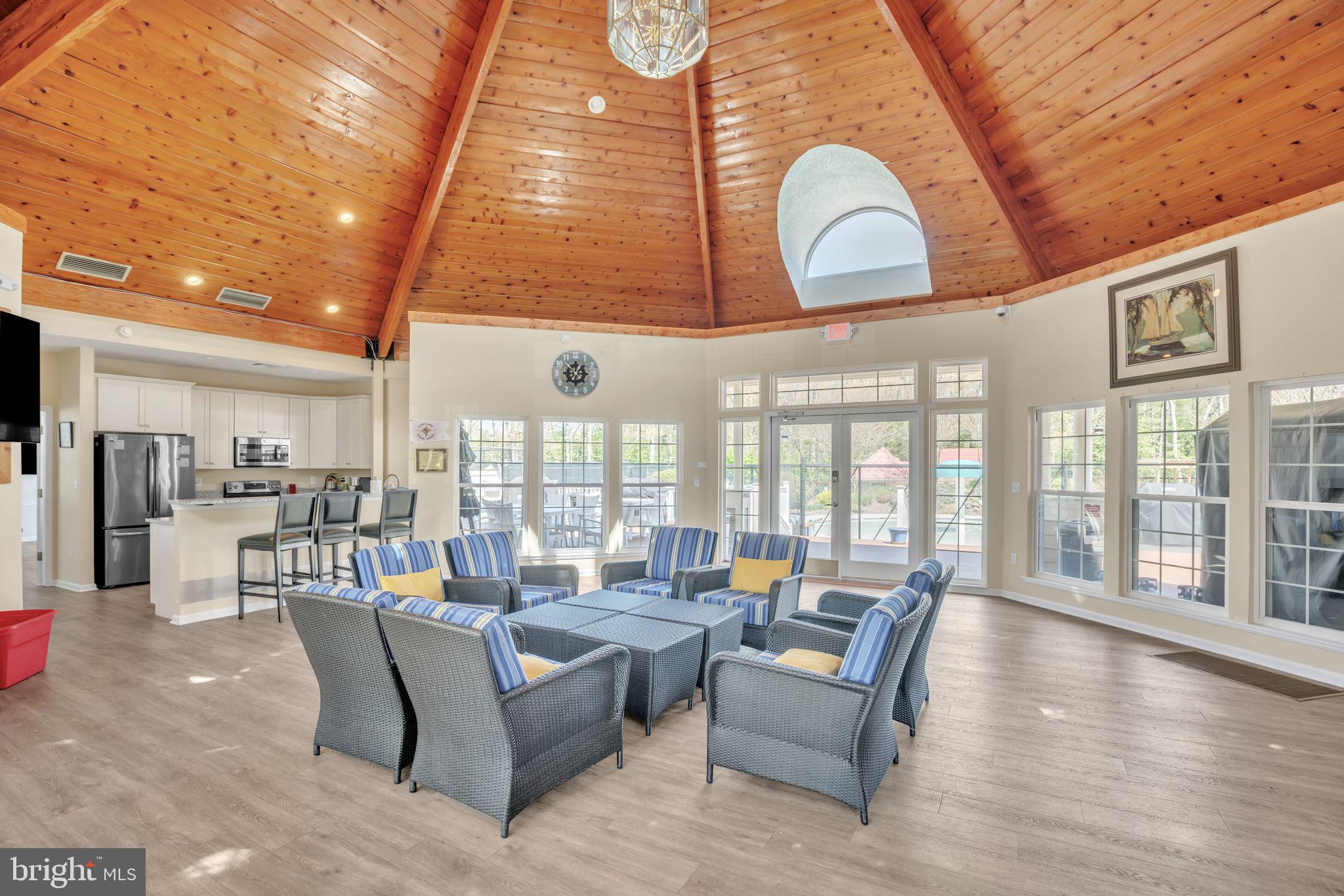534 Runabout Loop, Unit 534 Solomons, MD 20688 - Photo 35 of 36 a living room with furniture and a large window
