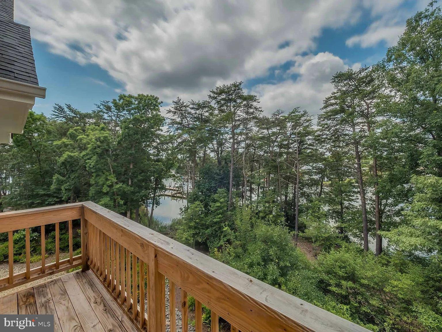534 Runabout Loop, Unit 534 Solomons, MD 20688 - Photo 5 of 36 a view of a balcony with trees
