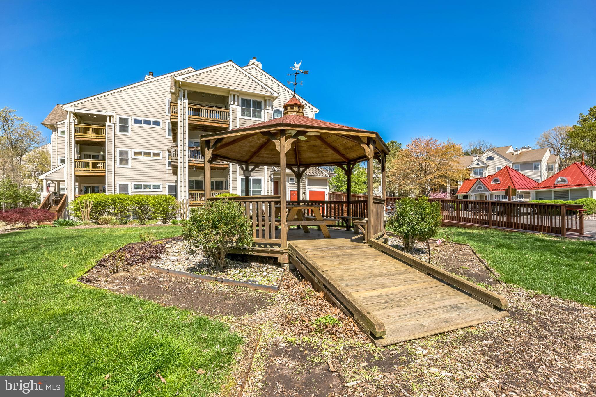 534 Runabout Loop, Unit 534 Solomons, MD 20688 - Photo 6 of 36 a view of a house with backyard and sitting area
