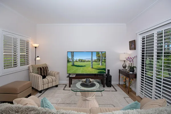 a room with furniture and a window