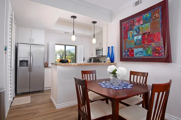 a view of a dining room with furniture