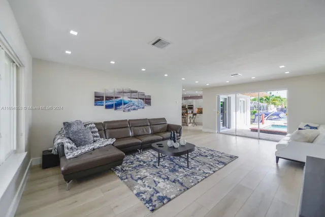 a living room with furniture and a couch