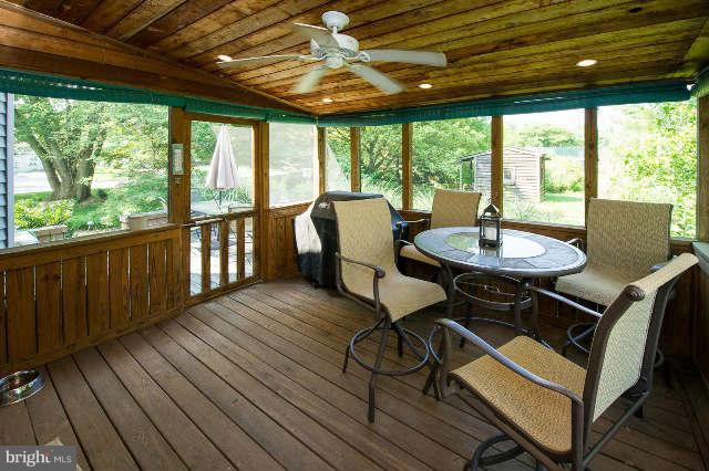 311 Saddle Ridge Road Annapolis, MD 21403 - Photo 22 of 30 a view of a dining room with furniture window and outside view