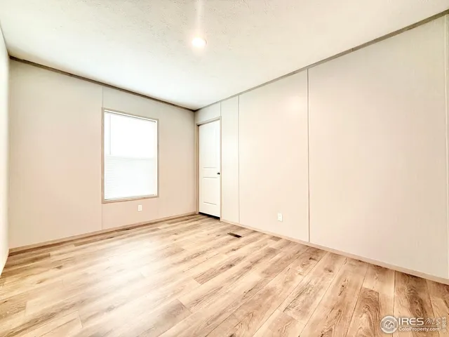 an empty room with a natural light