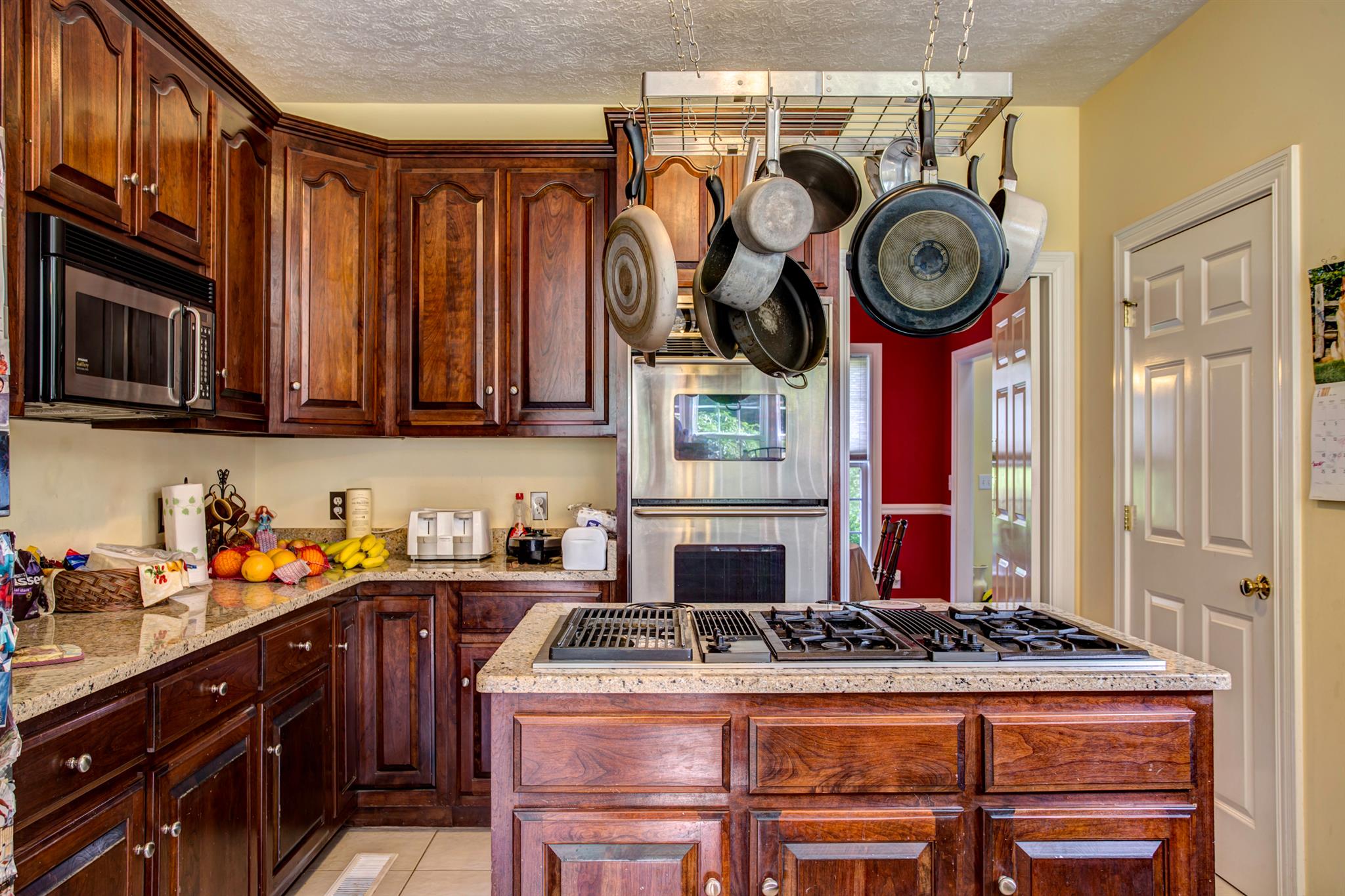 3350 Maxie Jones Road Springfield, TN 37172 - Photo 2 of 30 a kitchen with a stove and a clock