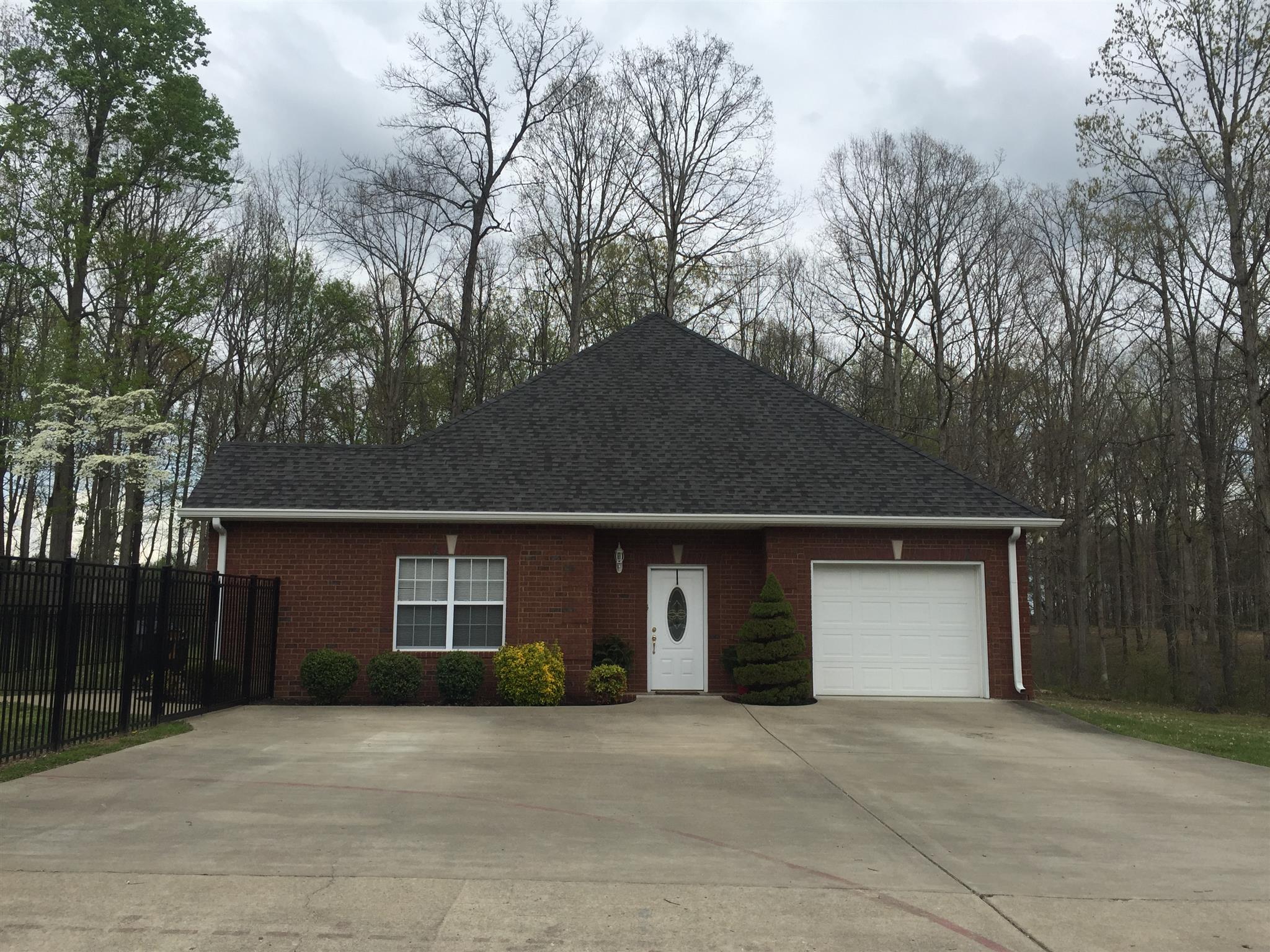 3350 Maxie Jones Road Springfield, TN 37172 - Photo 15 of 30 a front view of house with yard and trees