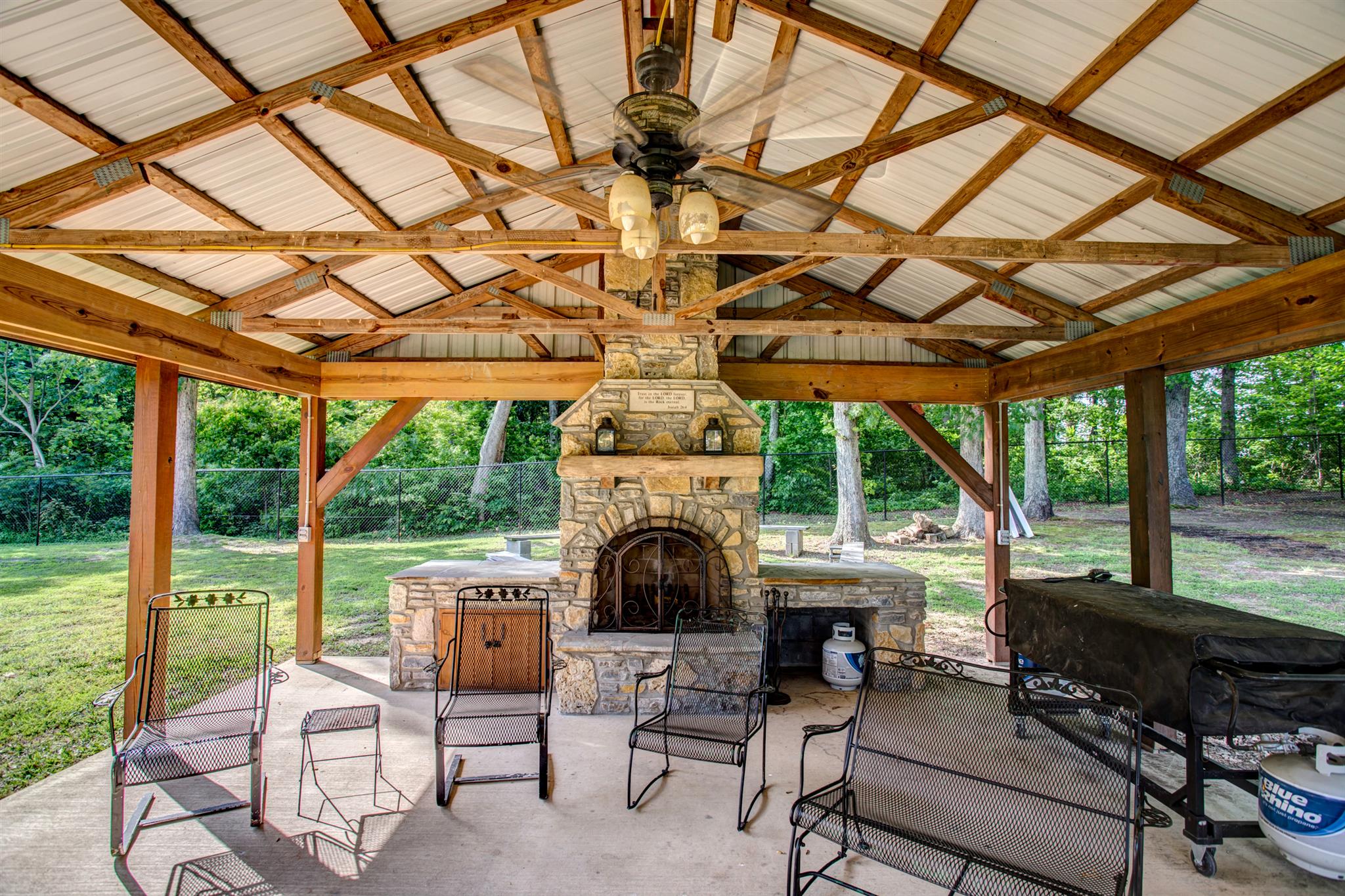 3350 Maxie Jones Road Springfield, TN 37172 - Photo 24 of 30 a view of a patio with table and chairs next to a yard