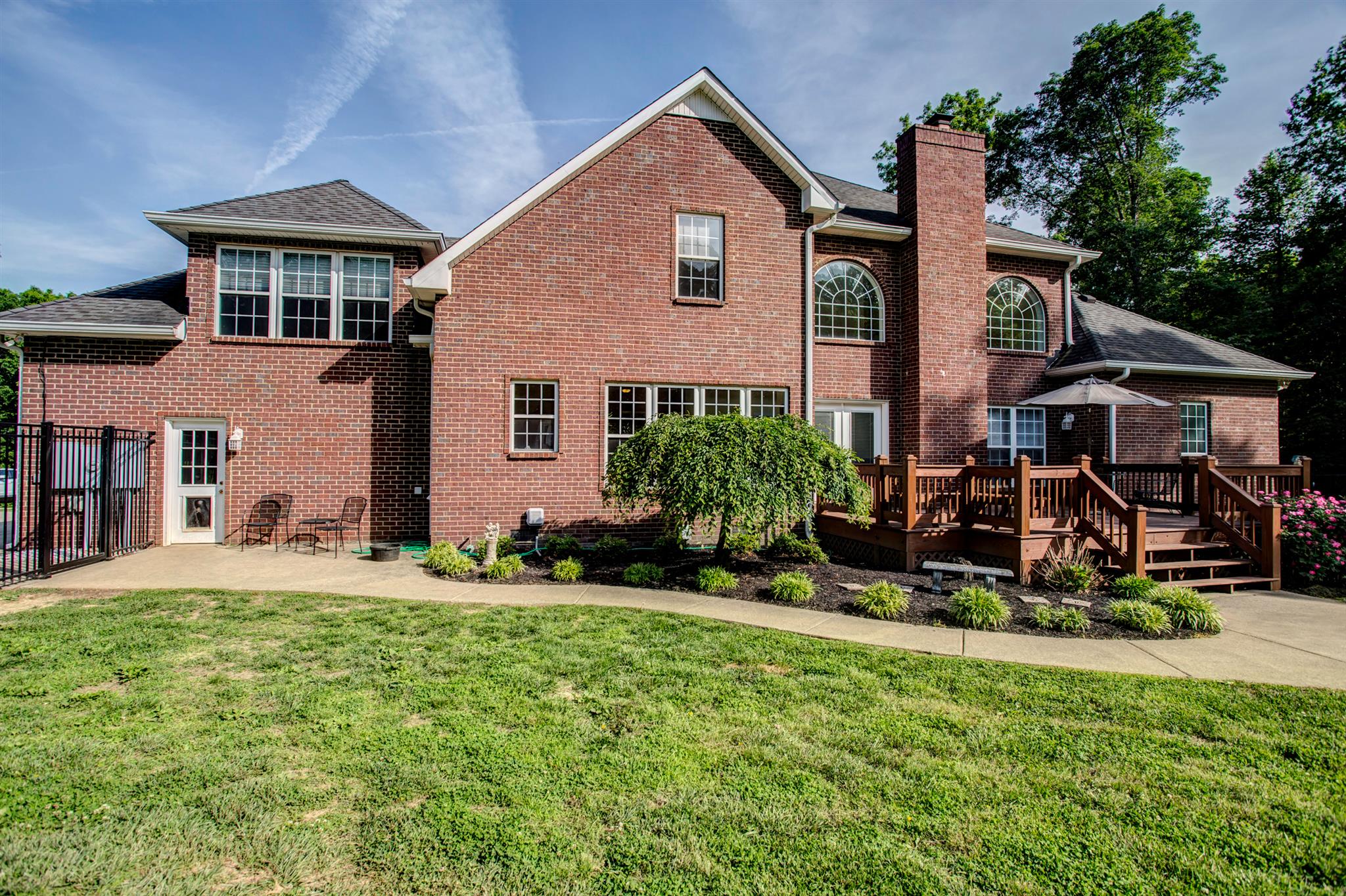 3350 Maxie Jones Road Springfield, TN 37172 - Photo 29 of 30 a view of a house with a yard and plants