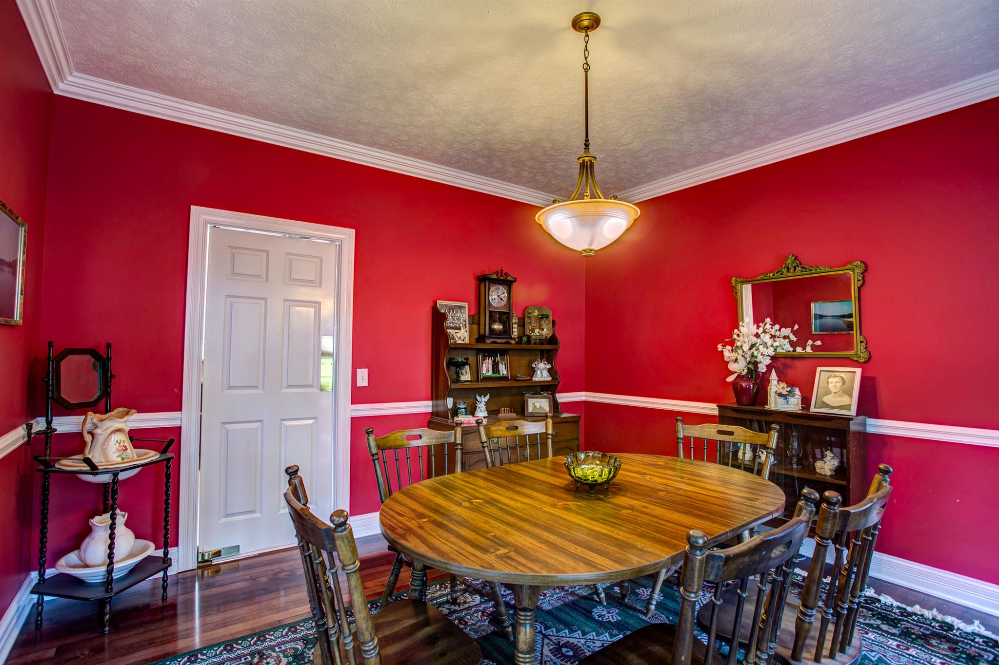 3350 Maxie Jones Road Springfield, TN 37172 - Photo 6 of 30 a view of a dining room with furniture and a chandelier