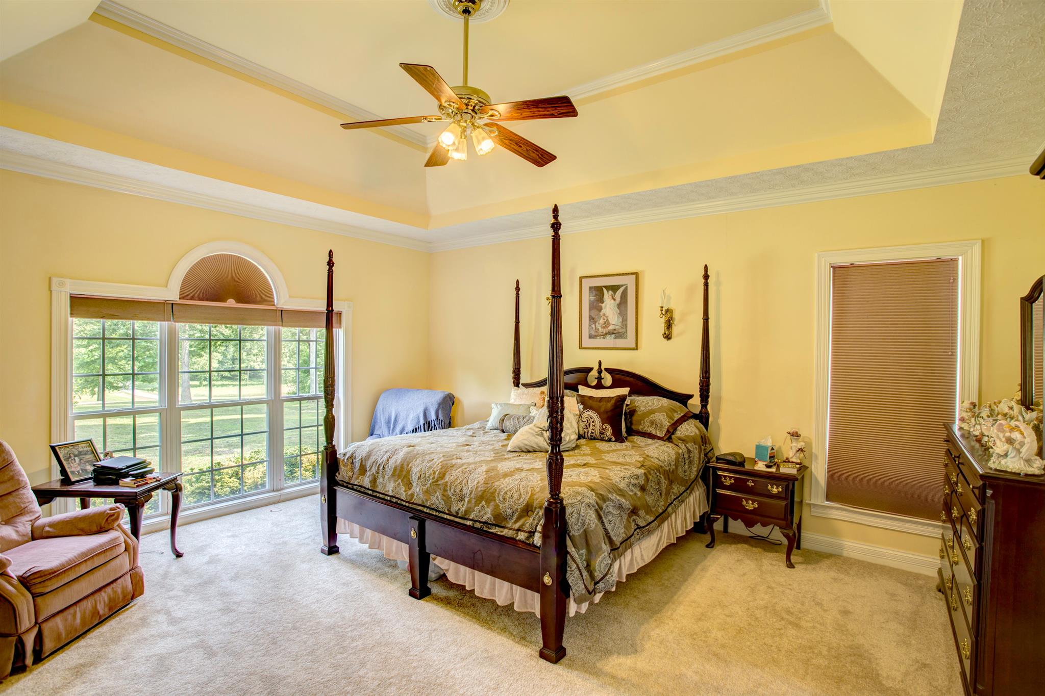 3350 Maxie Jones Road Springfield, TN 37172 - Photo 10 of 30 a bedroom with a bed and a chandelier