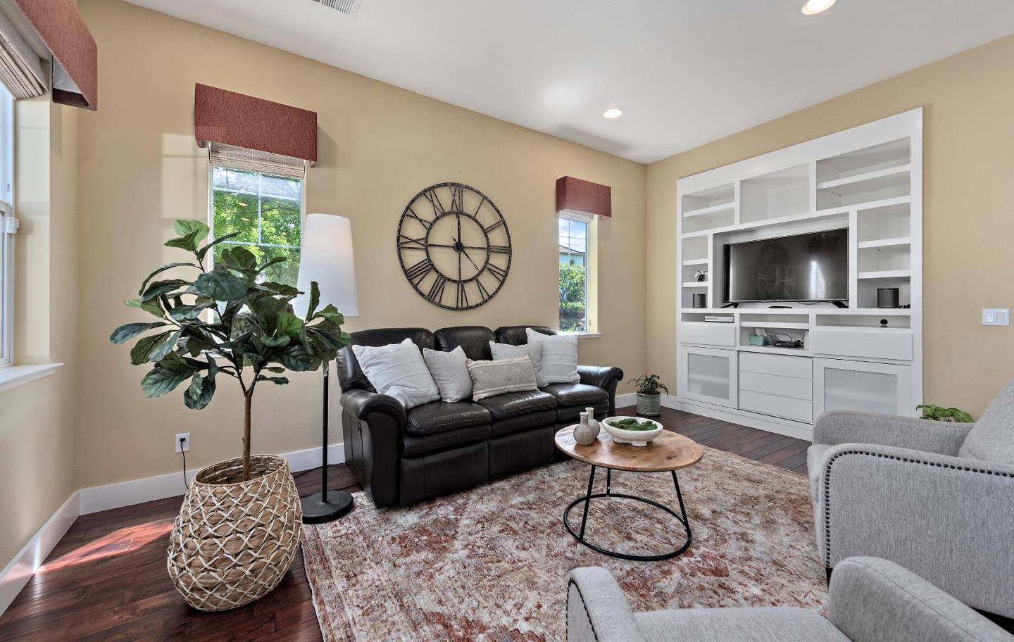 7581 Edinburgh Way Gilroy, CA 95020 - Photo 12 of 38 a living room with furniture a rug and a window