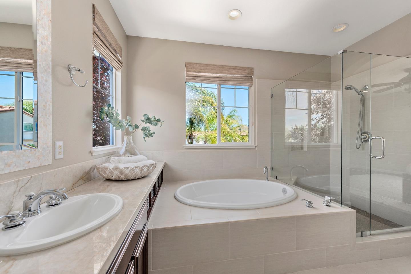 7581 Edinburgh Way Gilroy, CA 95020 - Photo 18 of 38 a bathroom with a sink and a mirror